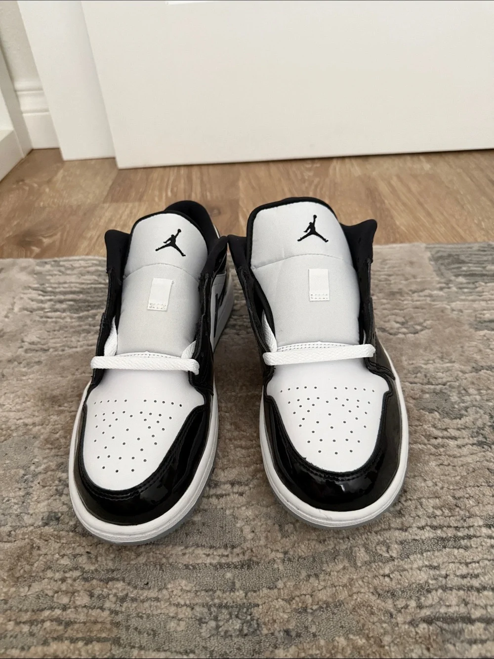 Jordan Low Top Sneakers in White and Black Patent